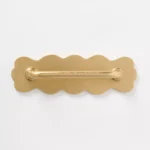 scalloped gold hardware